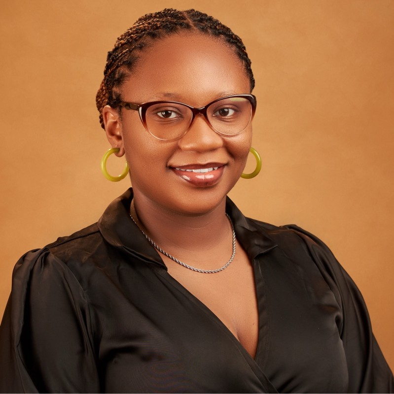 Professional headshot of Vanessa Ogenyi, Product Designer and Virtual Assistant, smiling at the camera
